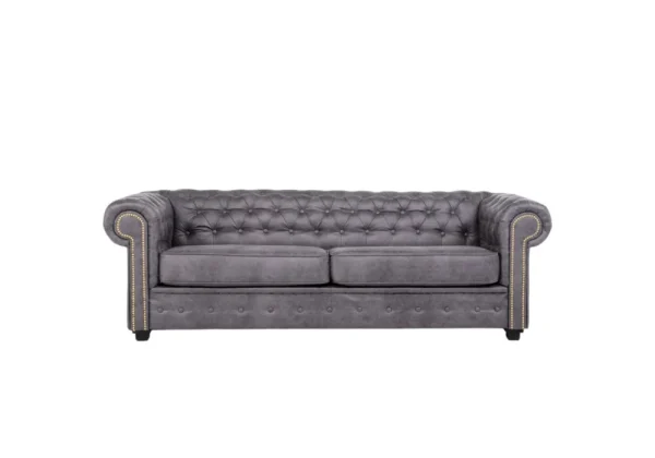 A luxurious grey Chesterfield-style sofa bed, providing comfortable seating for three and converting into a bed for guests, with contemporary sparkly details.