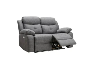 The Caro two-seater electric recliner loveseat in stylish grey fabric, highlighting its space-saving design and powered mechanism.