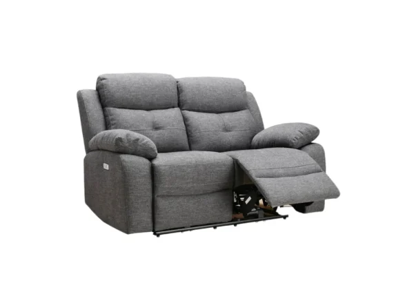 The Caro two-seater electric recliner loveseat in stylish grey fabric, highlighting its space-saving design and powered mechanism.